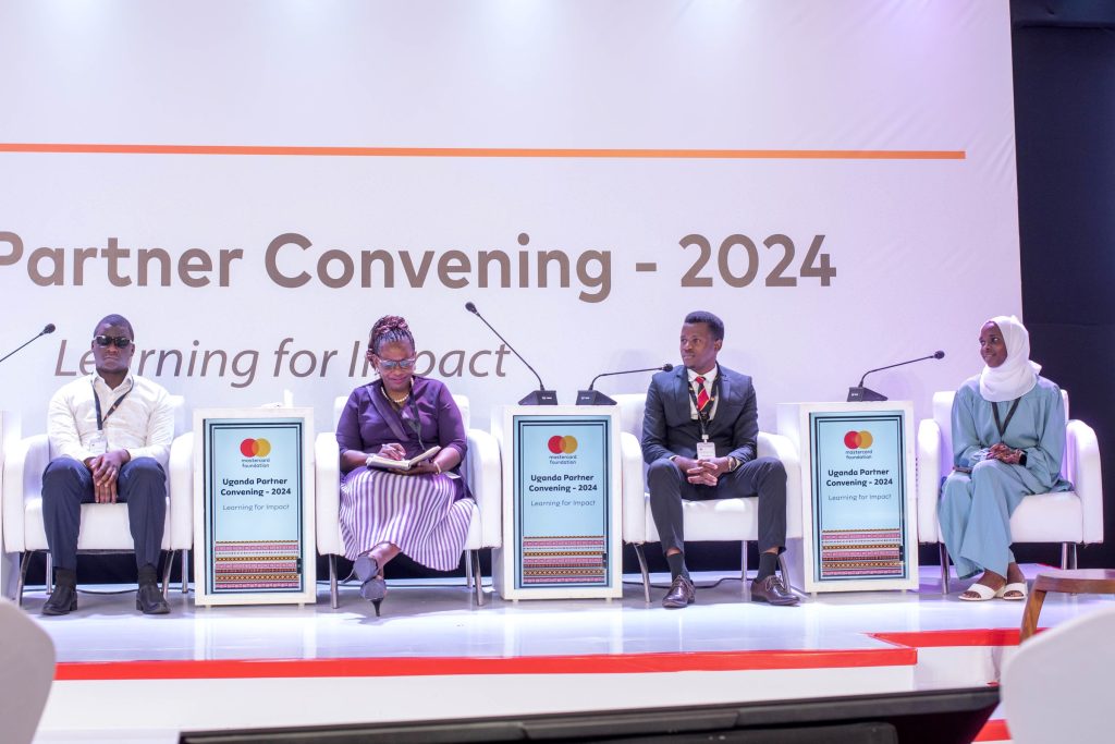 Prof. Namaalwa, flanked by student leaders; Mr. Kakooza (Left), Mr. Wilson Gonza, and Ms. Mariat Namiiro (Right), during the panel discussion.