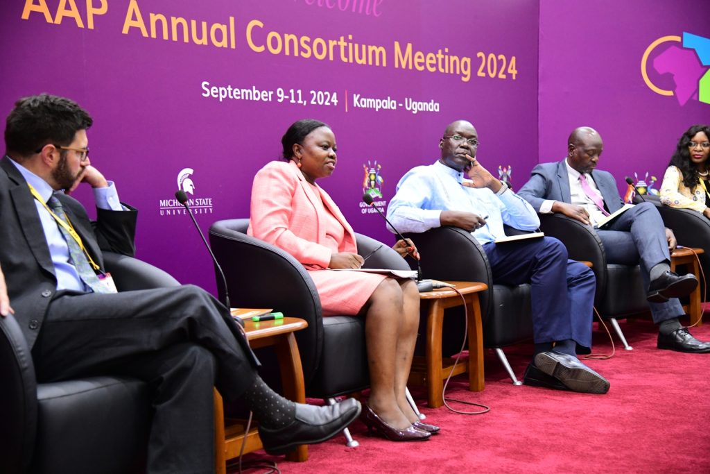 Dr. Elizabeth Nansubuga (2nd Left) outlines HERS-EA's contribution. Alliance for African Partnership (AAP) of Michigan State University (MSU) Annual Consortium Meeting. Hosted by Makerere University in the School of Public Health Conference Hall, Kampala Uganda, East Africa 9th-11th September 2024.