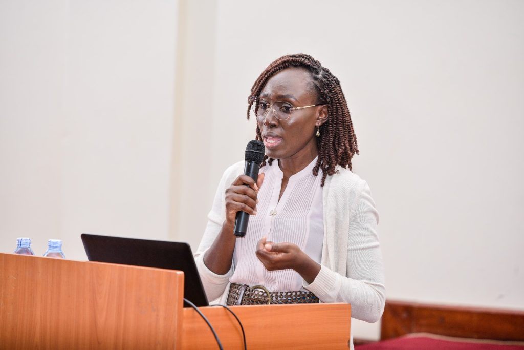 Ms. Alice Menya briefing participants about the activities of LEARN. Leiden-Delft-Erasmus East Africa Research Network (LEARN) in collaboration with the Urban Action Lab at Makerere University a workshop to deliberate strategies for mitigating the impacts of climate change in urban centres in the East African Region, Theme: “Resilient Urban Futures: Adapting Livelihoods to Climate Change”, 4th-5th September 2024, School of Public Health Auditorium, Kampala Uganda.