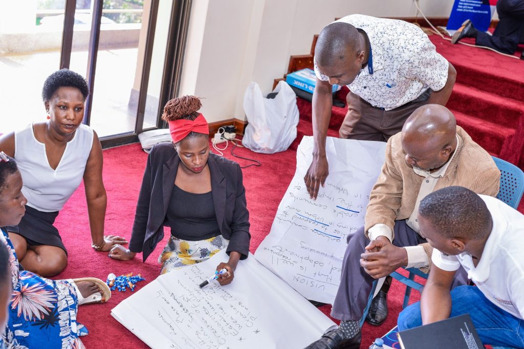 Participants in focused group discussions. Leiden-Delft-Erasmus East Africa Research Network (LEARN) in collaboration with the Urban Action Lab at Makerere University a workshop to deliberate strategies for mitigating the impacts of climate change in urban centres in the East African Region, Theme: “Resilient Urban Futures: Adapting Livelihoods to Climate Change”, 4th-5th September 2024, School of Public Health Auditorium, Kampala Uganda.