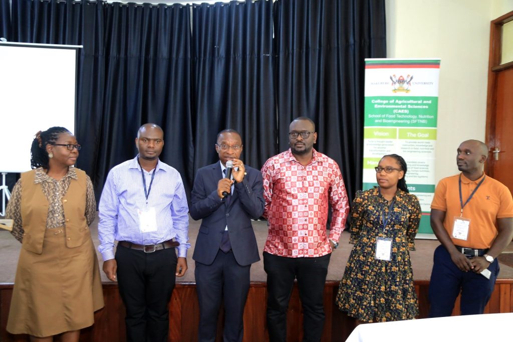 The Project Coordinator, Prof. John Muyonga introducing some of the project members during the dissemination workshop. Funded to the tune of 7 million euros by the European Commission within the Horizon 2020 programme, and led by Alma Mater Studiorum – University of Bologna (Italy), FoodLAND project Research Dissemination for Wakiso District, 29th July 2024, School of Food Technology, Nutrition and Bioengineering, Conference Hall, Makerere University, Kampala Uganda, East Africa.