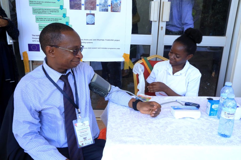 Prof. Muyonga during the clinical screening session held on the slidelines of the dissemination workshop. Funded to the tune of 7 million euros by the European Commission within the Horizon 2020 programme, and led by Alma Mater Studiorum – University of Bologna (Italy), FoodLAND project Research Dissemination for Wakiso District, 29th July 2024, School of Food Technology, Nutrition and Bioengineering, Conference Hall, Makerere University, Kampala Uganda, East Africa.