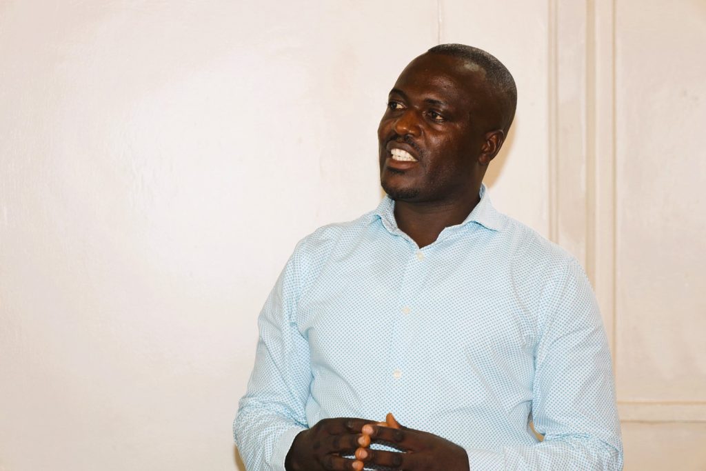 Mr. Musinguzi addresses the participants. Department of Science Technical and Vocational Education, College of Education and External Studies (CEES), Makerere University, Kampala Uganda, East Africa, research dissemination, pioneering findings on integrating Indigenous Knowledge Systems (IKS) such as ethnomathematics in teaching and learning school mathematics, 3rd September 2024.