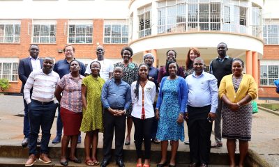 Participants pose for a group photo with the facilitators from University of Edinburgh - Dr. Michael Gallagher and Dr. Peter Evans. Specialized training on research methodology and the presentation of research findings as part of the Digital Education Practitioner Networks, supported by the MasterCard Foundation Scholars Program, in collaboration with the University of Edinburgh, 1st-3rd September 2024, College of Business and Management Sciences (CoBAMS) Conference Room, Makerere University, Kampala Uganda, East Africa.