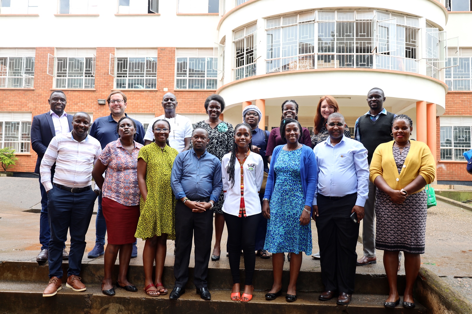 Participants pose for a group photo with the facilitators from University of Edinburgh - Dr. Michael Gallagher and Dr. Peter Evans. Specialized training on research methodology and the presentation of research findings as part of the Digital Education Practitioner Networks, supported by the MasterCard Foundation Scholars Program, in collaboration with the University of Edinburgh, 1st-3rd September 2024, College of Business and Management Sciences (CoBAMS) Conference Room, Makerere University, Kampala Uganda, East Africa.