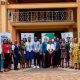 Participants in the Gender Mainstreaming Directorate (GMD) - Michigan State University (MSU) - Michigan Fellows Africa Initiative (MFAI) Uganda symposium pose for a group photo outside the Senate Building on 10th September 2024. Gender Mainstreaming Directorate, in collaboration with Michigan State University (MSU) and the Michigan Fellows Africa Initiative (MFAI) Uganda, symposium aimed at raising awareness among university staff on how to address sexual harassment and related incidents, Telepresence Centre, Senate Building, Makerere University, Kampala Uganda, East Africa 10th September 2024.