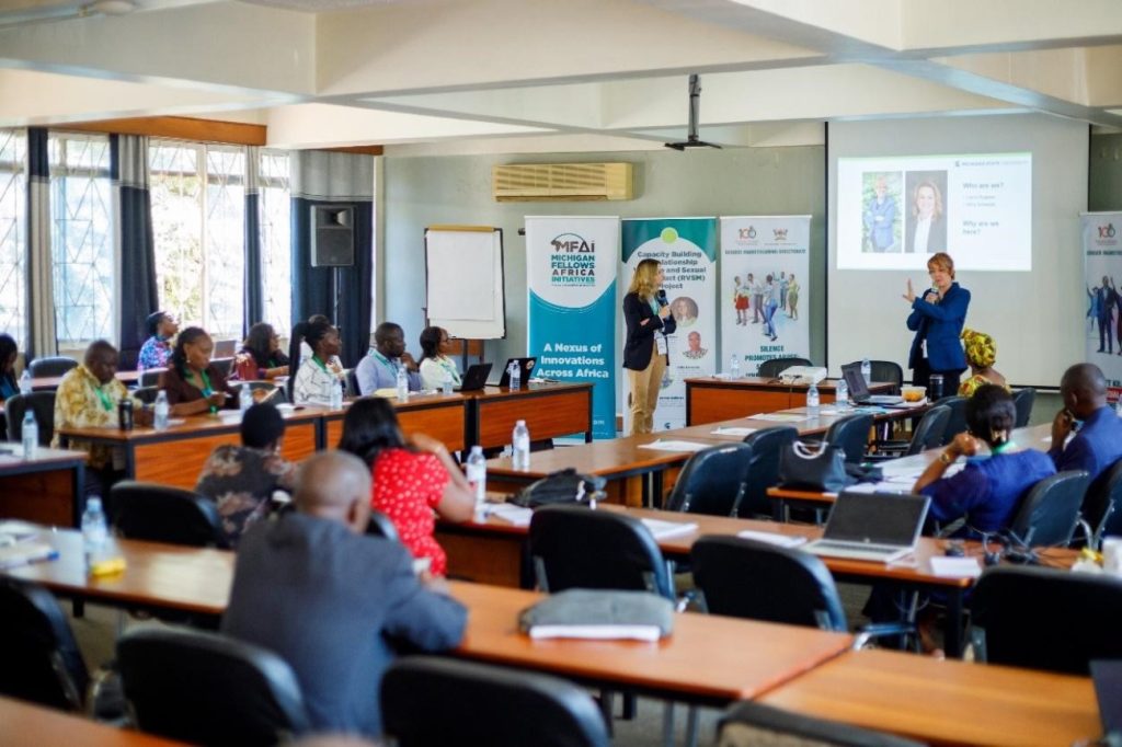 Part of the audience listens to Ms. Kelly Schweda (Right) and H.E Laura Rugless (Left) during the deliberations. Gender Mainstreaming Directorate, in collaboration with Michigan State University (MSU) and the Michigan Fellows Africa Initiative (MFAI) Uganda, symposium aimed at raising awareness among university staff on how to address sexual harassment and related incidents, Telepresence Centre, Senate Building, Makerere University, Kampala Uganda, East Africa 10th September 2024.