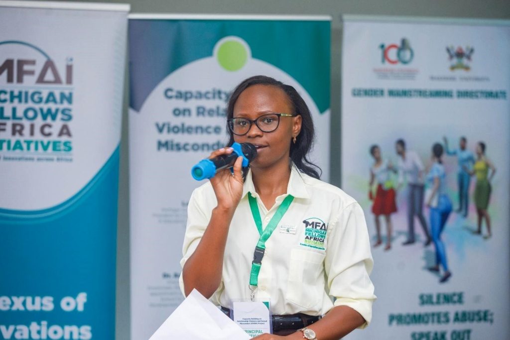 Ms. Dorcus Asiimwe moderates the event. Gender Mainstreaming Directorate, in collaboration with Michigan State University (MSU) and the Michigan Fellows Africa Initiative (MFAI) Uganda, symposium aimed at raising awareness among university staff on how to address sexual harassment and related incidents, Telepresence Centre, Senate Building, Makerere University, Kampala Uganda, East Africa 10th September 2024.