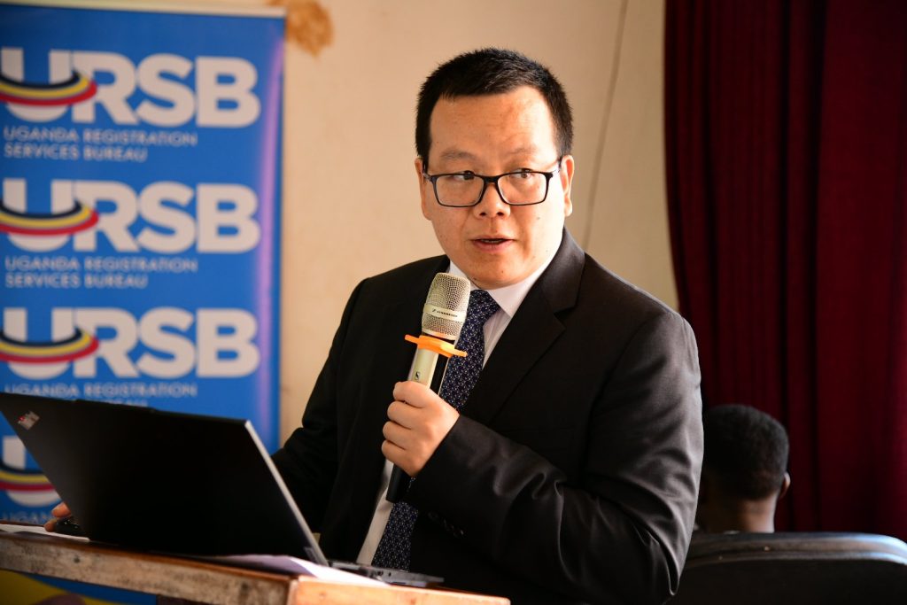 Mr. Yinghua Chen presents one of the topics during the seminar. World Intellectual Property Organisation (WIPO) roving seminar, calling for effective utilisation of the International Patent System by Universities in Uganda, held in collaboration with the Uganda Registration Services Bureau (URSB), Senate Conference Hall, Makerere University, Kampala Uganda, East Africa, 6th September 2024.