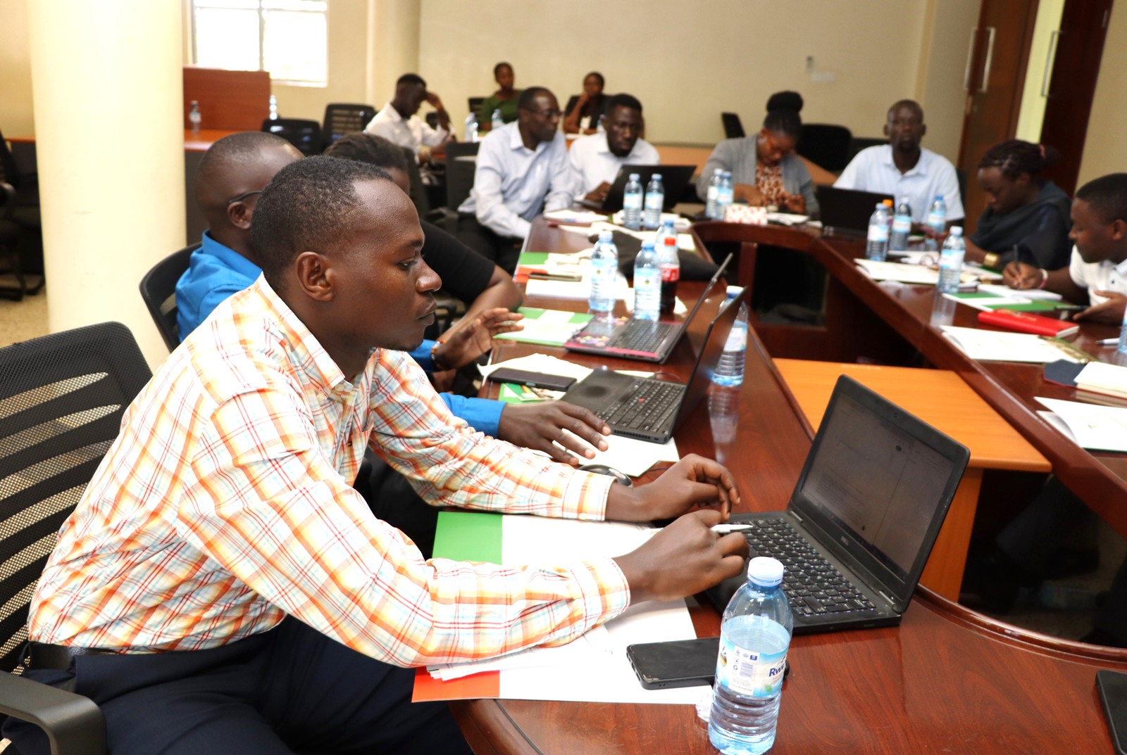 A section of participants conducting an exercise on use of AI in perfecting their work. Environment for Development (EfD) Mak Centre Specialized Training aimed at enhancing 30 researchers' and graduate students' skills in research co-creation, science communication, and policy engagement, 15th October 2024, Yusuf Lule Central Teaching Facility, Makerere University, Kampala Uganda, East Africa.