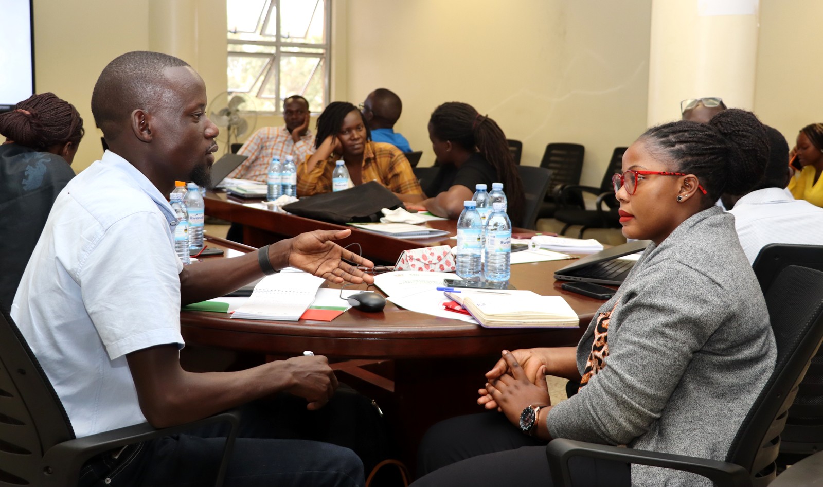 Robert (Left) and Namulemi (Right) acting as Journalist and Researcher in an interview. Environment for Development (EfD) Mak Centre Specialized Training aimed at enhancing 30 researchers' and graduate students' skills in research co-creation, science communication, and policy engagement, 15th October 2024, Yusuf Lule Central Teaching Facility, Makerere University, Kampala Uganda, East Africa.