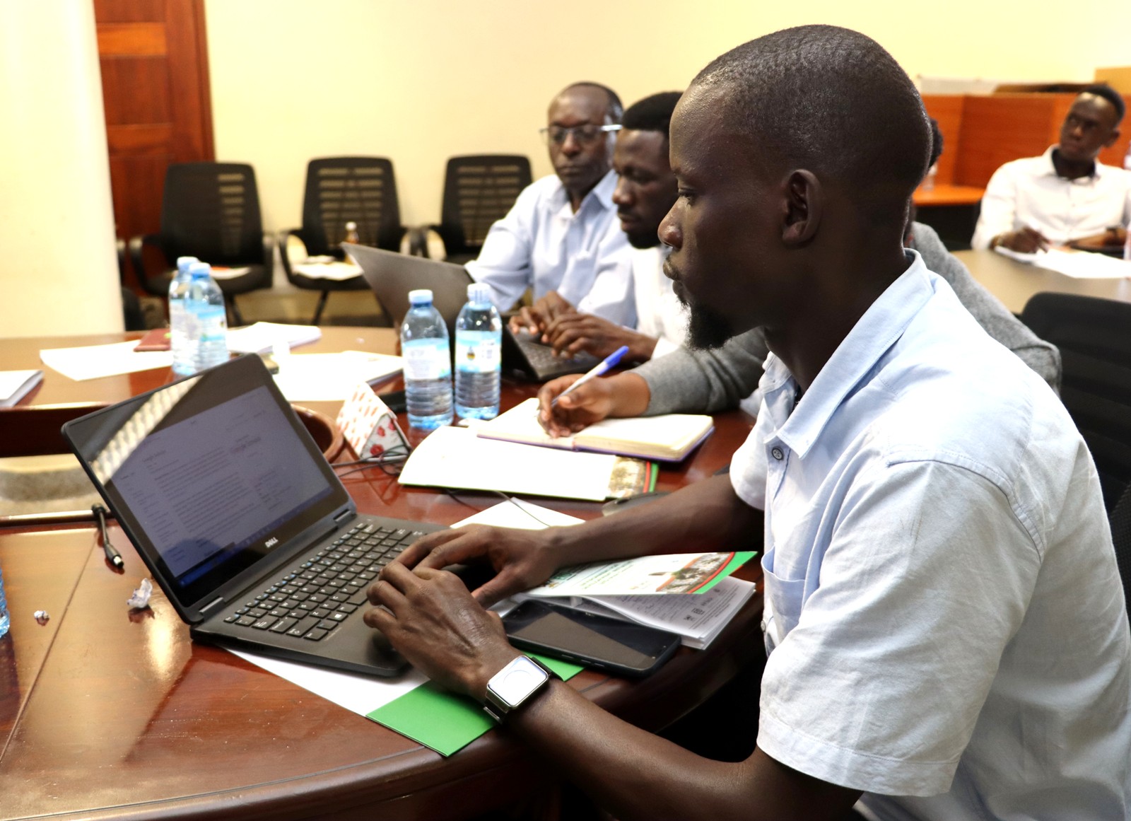 Robert Opus doing an exercise on his laptop. Environment for Development (EfD) Mak Centre Specialized Training aimed at enhancing 30 researchers' and graduate students' skills in research co-creation, science communication, and policy engagement, 15th October 2024, Yusuf Lule Central Teaching Facility, Makerere University, Kampala Uganda, East Africa.