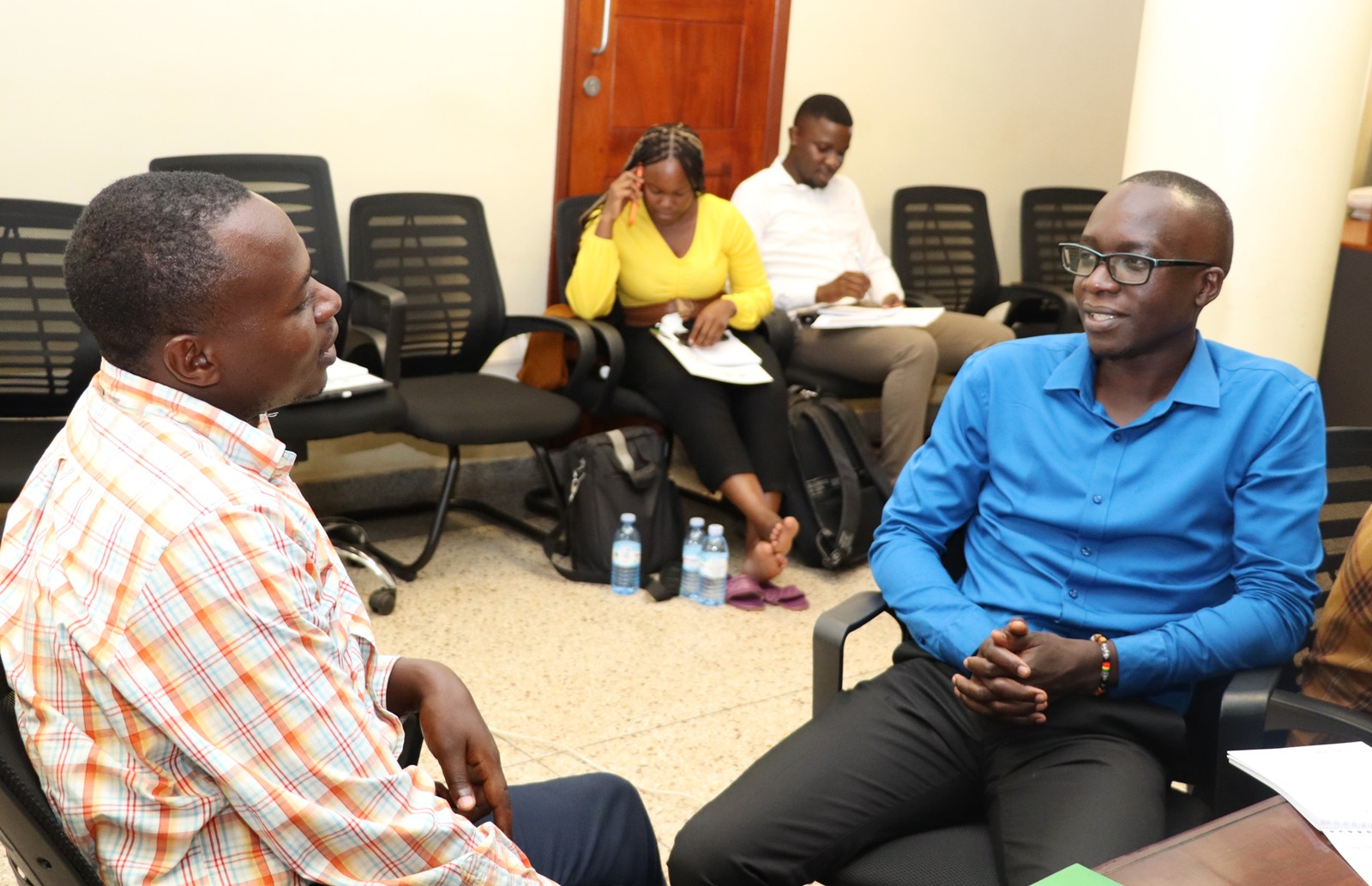 Paired participants in a role play. Environment for Development (EfD) Mak Centre Specialized Training aimed at enhancing 30 researchers' and graduate students' skills in research co-creation, science communication, and policy engagement, 15th October 2024, Yusuf Lule Central Teaching Facility, Makerere University, Kampala Uganda, East Africa.