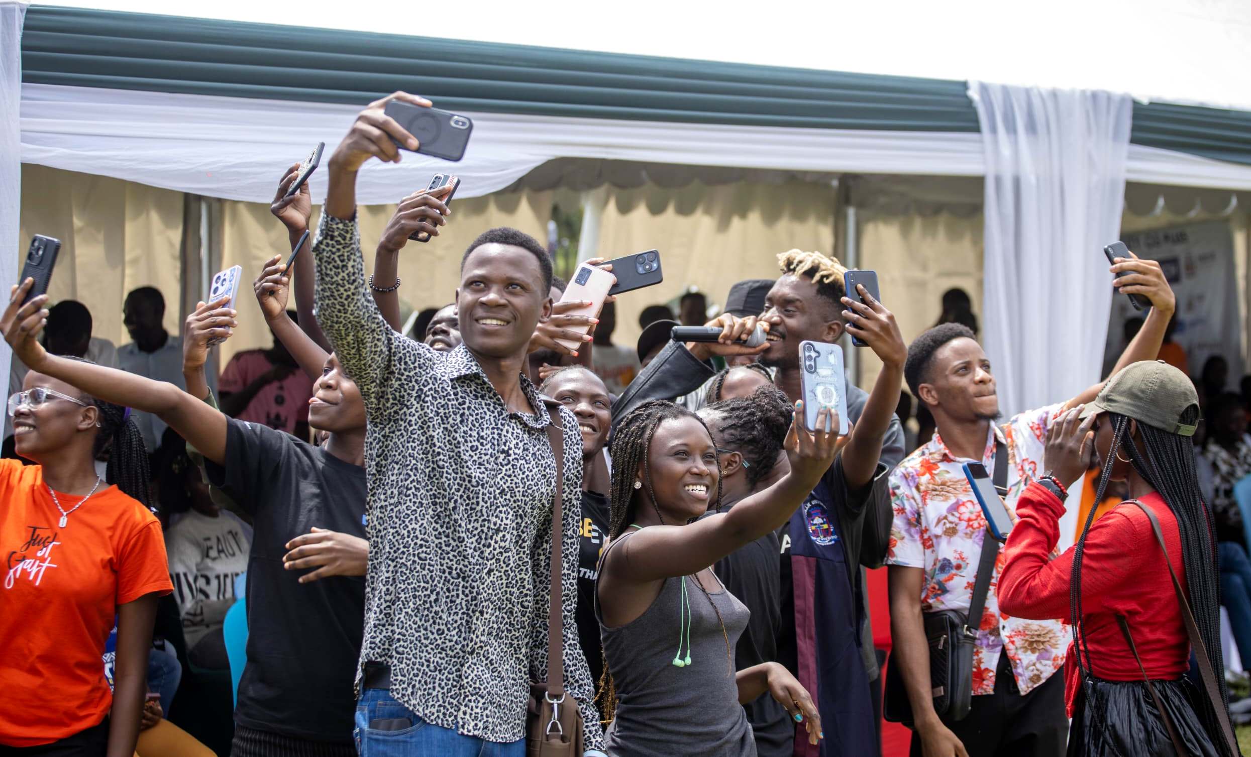 Artiste APass entertains participants. Launch of the "Safer Campuses Campaign," aimed at shattering the silence surrounding Gender-Based Violence (GBV) in partnership with UNESCO, 4th October 2024, Freedom Square, Makerere University, Kampala Uganda, East Africa.