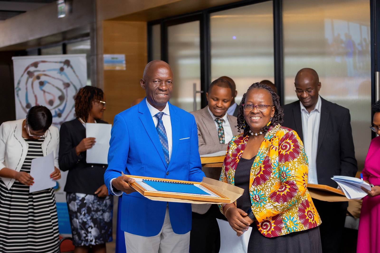 Prof. Grace Bantebya-Kyomuhendo, a Professor of Women and Gender Studies at Makerere University— and the first female head of the academy in a photo with Prof. David Guwatudde. Four Makerere University School of Public Health (MakSPH) faculty induction into the 2024 Uganda National Academy of Sciences (UNAS) fellowship, 1st November 2024, Four Points by Sheraton, Kampala Uganda, East Africa.