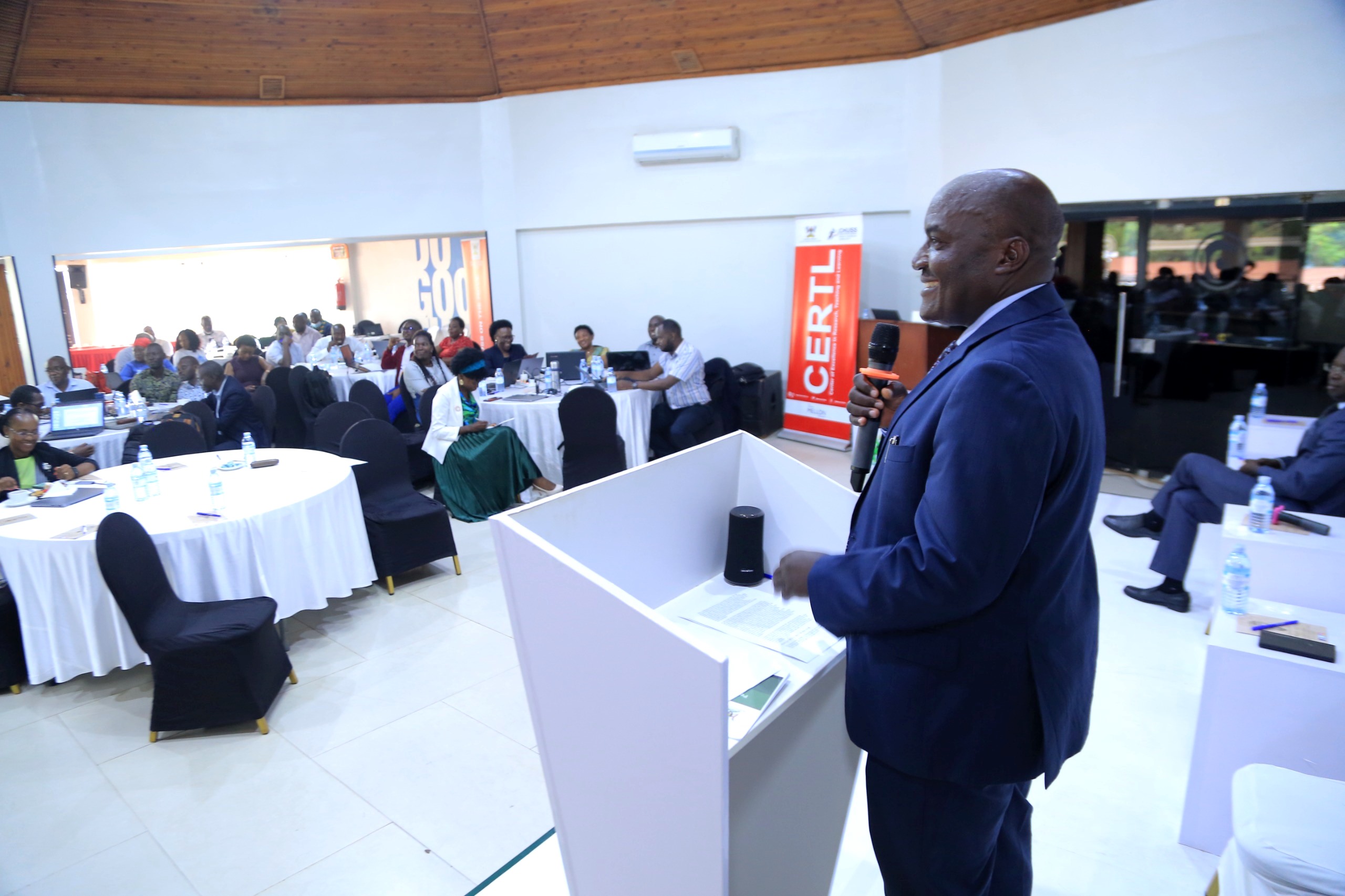 Prof. Fred Masagazi-Masaazi, Chair of the Mak RIF Grants Management Committee addresses the conference. Makerere University College of Humanities and Social Sciences (CHUSS) Centre of Excellence in Research, Teaching and Learning (CERTL) International Conference, Fairway Hotel, Kampala Uganda, East Africa. 15th November 2024.