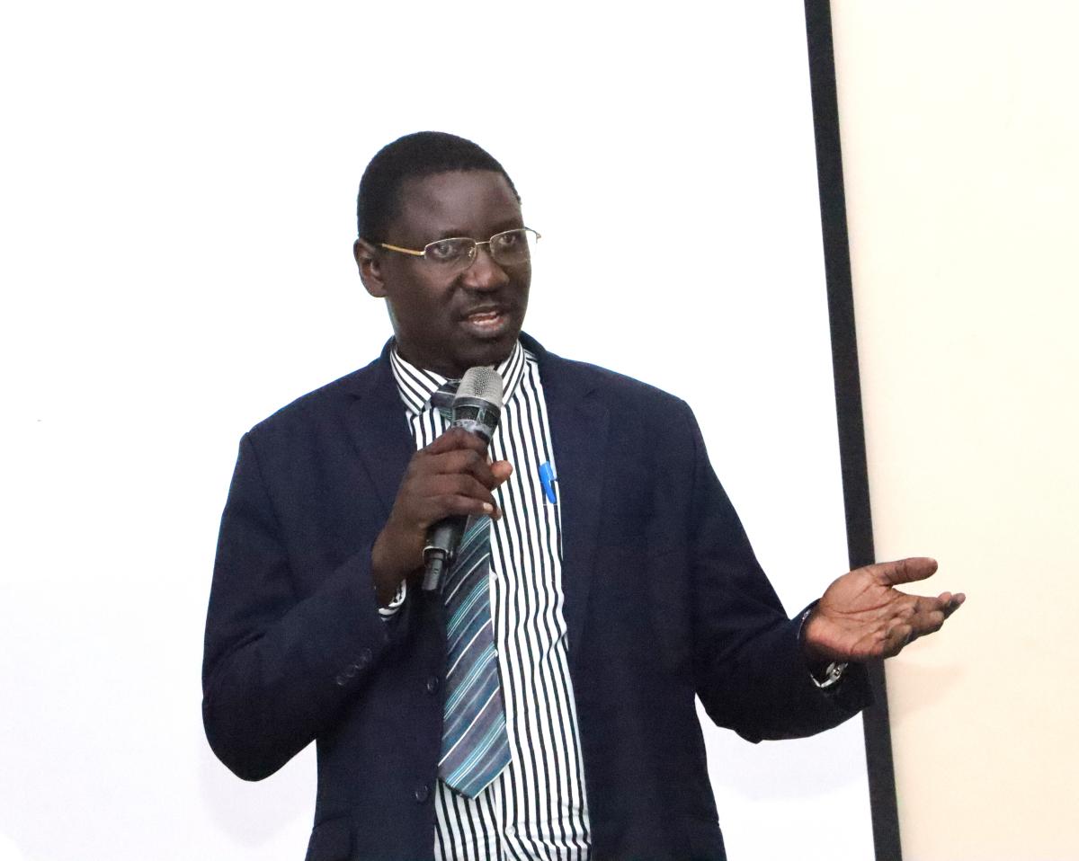 Dr. Cyprian Misinde addressing staff on the e-timetable and the biometric system. Makerere University College of Humanities and Social Sciences (CHUSS) Staff Retreat, 1st-2nd November 2024, Nican Resort Hotel, Seguku Entebbe Road, Kampala Uganda, East Africa.