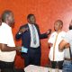 The Quality Assurance Director Dr. Cyprian Misinde (C) interacts with staff after the presentations on 1st November 2024. Makerere University College of Humanities and Social Sciences (CHUSS) Staff Retreat, 1st-2nd November 2024, Nican Resort Hotel, Seguku Entebbe Road, Kampala Uganda, East Africa.