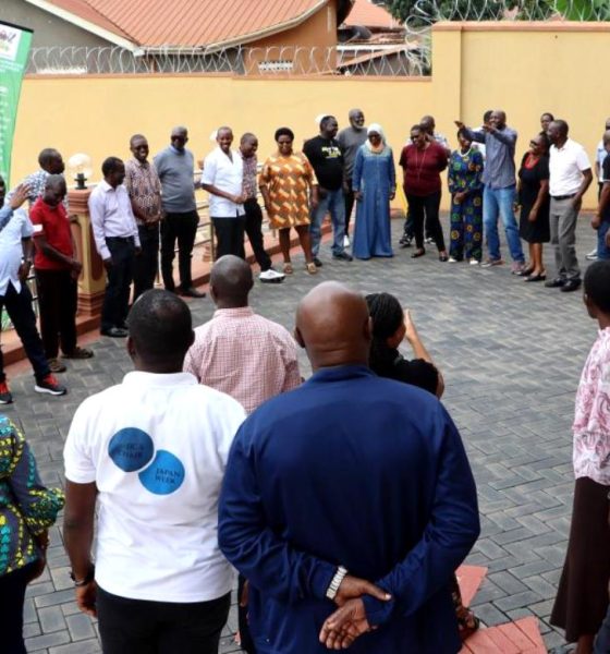 A Trainer, Mr. Ivan Kalema with staff outside the hotel conducting drills on leadership. Makerere University College of Humanities and Social Sciences (CHUSS) Staff Retreat, 1st-2nd November 2024, Nican Resort Hotel, Seguku Entebbe Road, Kampala Uganda, East Africa.