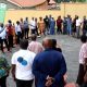 A Trainer, Mr. Ivan Kalema with staff outside the hotel conducting drills on leadership. Makerere University College of Humanities and Social Sciences (CHUSS) Staff Retreat, 1st-2nd November 2024, Nican Resort Hotel, Seguku Entebbe Road, Kampala Uganda, East Africa.