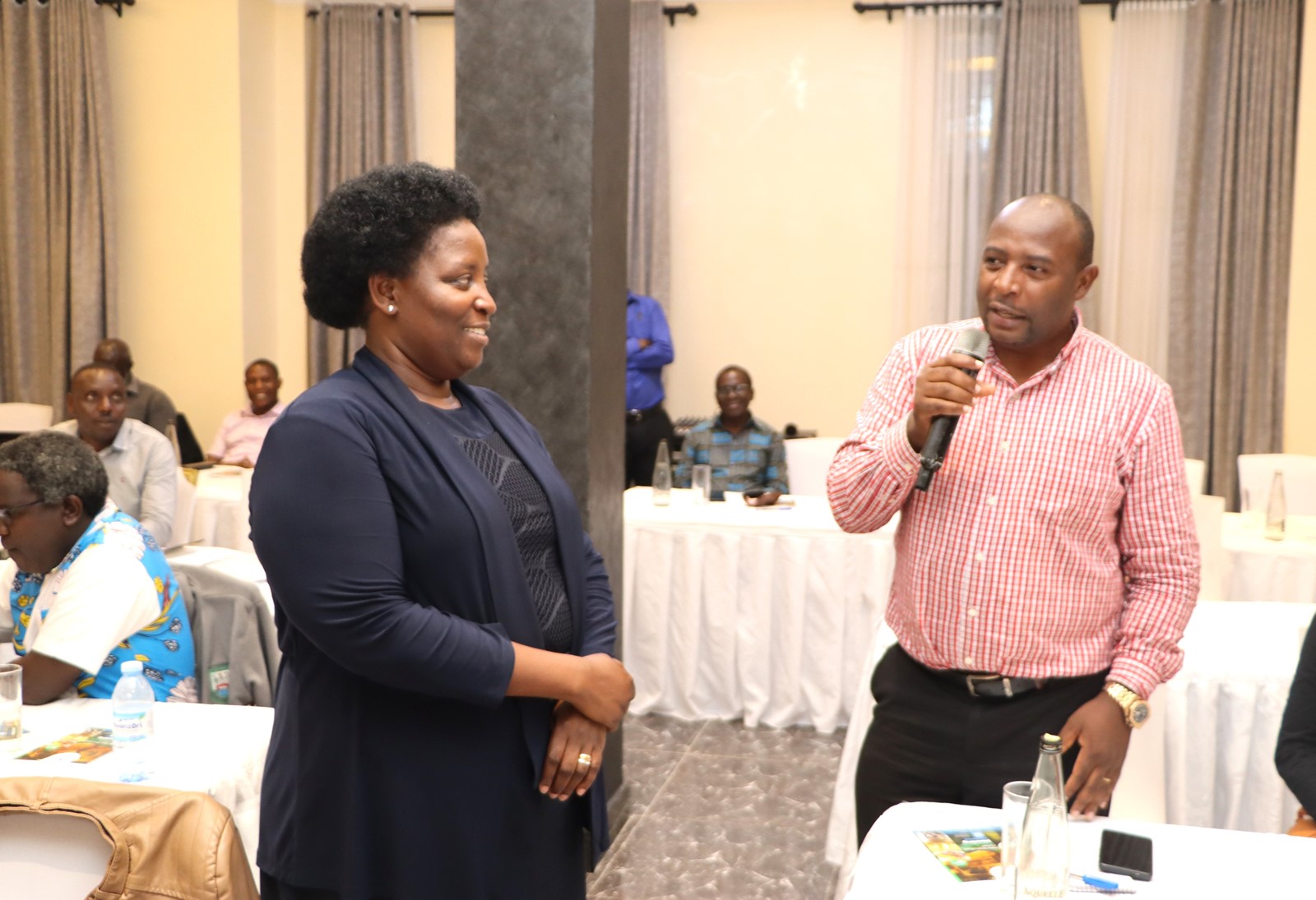 Prof. Helen Nkabala moderating the question and answer session as Assistant Registrar Dan Kiganda contributes. Makerere University College of Humanities and Social Sciences (CHUSS) Staff Retreat, 1st-2nd November 2024, Nican Resort Hotel, Seguku Entebbe Road, Kampala Uganda, East Africa.