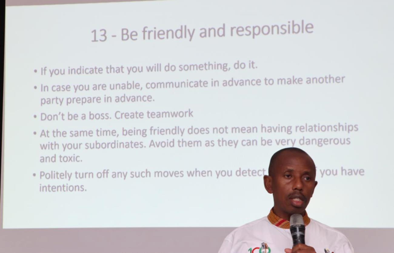 Dr. Gumoshabe presents Etiquette on being friendly. Makerere University College of Humanities and Social Sciences (CHUSS) Staff Retreat, 1st-2nd November 2024, Nican Resort Hotel, Seguku Entebbe Road, Kampala Uganda, East Africa.