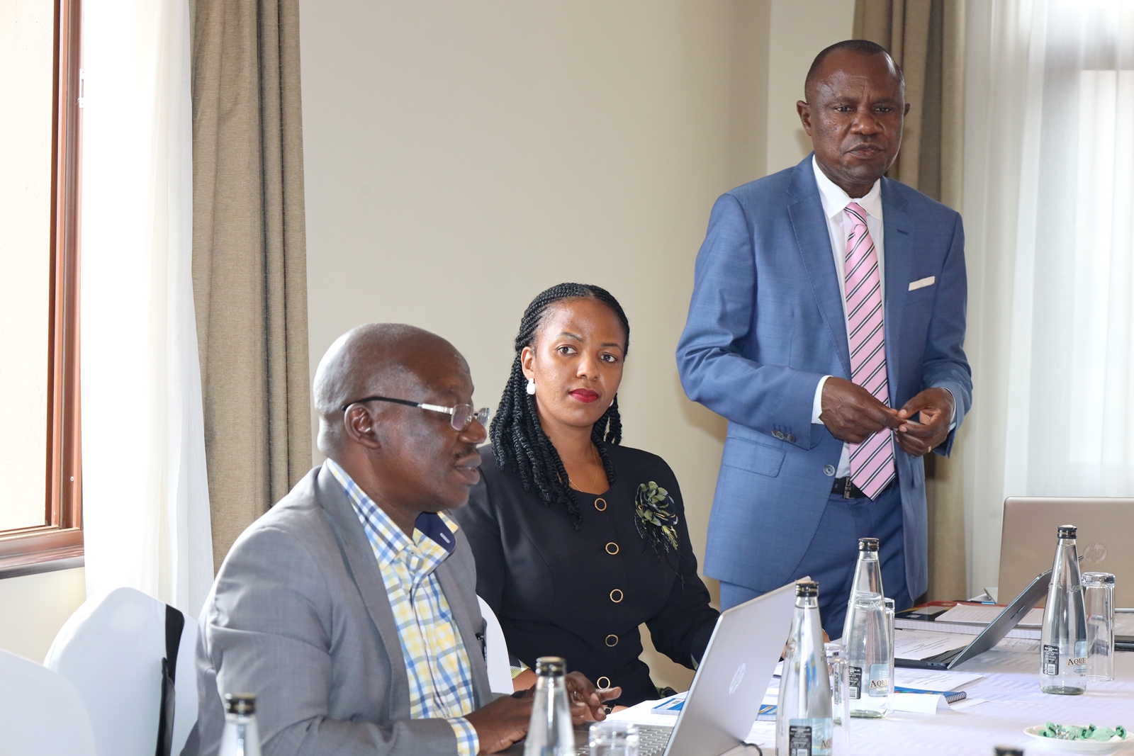 Prof. Eria Hisali, the Principal Investigator of the study (standing) delivers his presentation. College of Business and Management Sciences (CoBAMS), Makerere University inception workshop of the "Land Market, Use Patterns, and Relations in Uganda" study, 6th November 2024, Mestil Hotel, Kampala Uganda, East Africa.