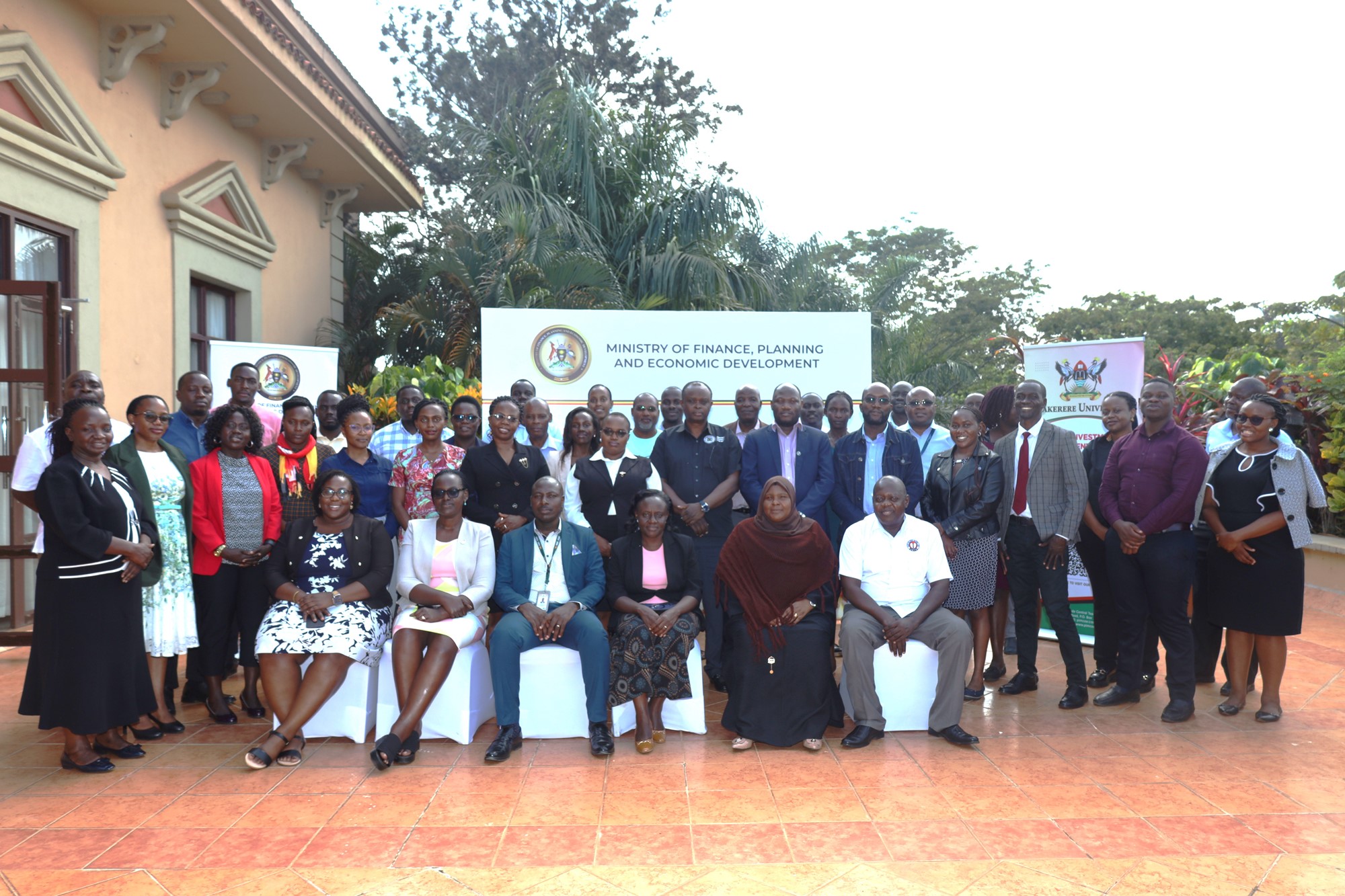 Group photo of the participants and trainers. Public Investment Management Centre of Excellence (PIM CoE) at Makerere University, in partnership with the Ministry of Finance, Planning & Economic Development (MoFPED), intensive training program aimed at enhancing public officers' skills in assessing the financial implications of proposed policies and legislation, 5th November 2024, Lake Victoria Serena Golf Resort, Kigo, Wakiso, Uganda, East Africa.