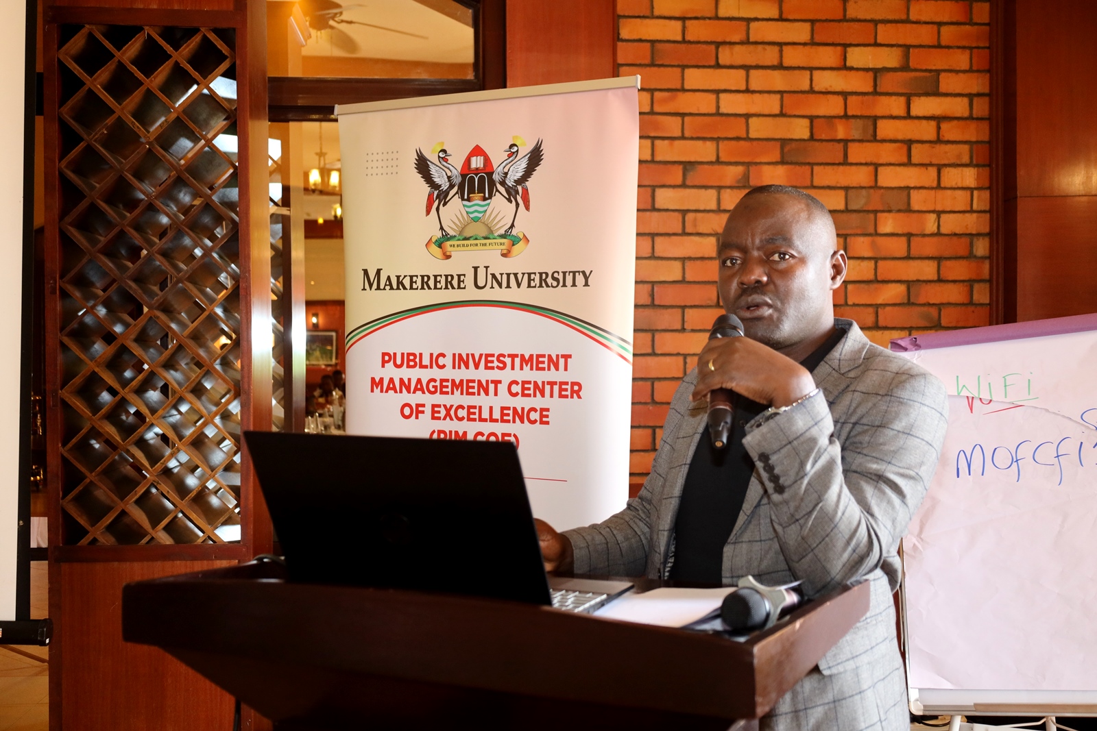 Mr Sonko addresses trainees at the close of the training. Public Investment Management Centre of Excellence (PIMCoE), hosted by the College of Business and Management Sciences, Makerere University, Kampala Uganda, East Africa, training of its 4th cohort of public officers on User Acceptance Training on Guidelines for Clearance of Financial Implications, November 15, 2024.