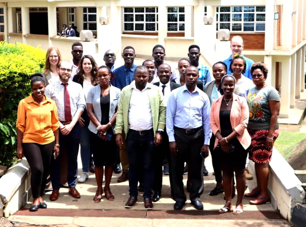 Participants posing for Group photo in front of Block A, College of Computing and Information Sciences. Two-day workshop on Artificial Intelligence (AI) for students and staff participating in the Erasmus+ exchange program, 11th-12th November 2024, Conference Room, Level 4, College of Computing and Information Sciences (CoCIS), Makerere University, Kampala Uganda, East Africa.