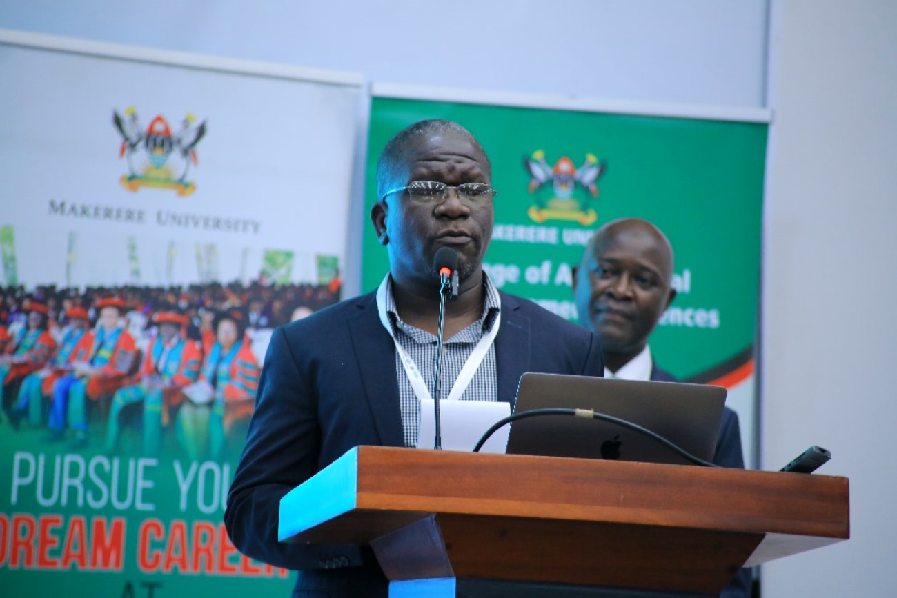 Co-Chair, Dr. Jerome Ssebaduka Lugimira makes his remarks at the Conference. College of Agricultural and Environmental Sciences (CAES), Makerere University in partnership with International Geographical Union (IGU) Commission of Biogeography and Biodiversity, the IGU Commission on African Studies, Uganda Geographical Association, and the International Association of Landscape Ecology (IALE) African Chapter, 3rd International Conference on Geographical Science for Resilient Communities, Ecosystems and Livelihoods under Global Environmental Change (GORILLA), Day 1, 4th December 2024, Hotel Africana, Kampala Uganda, East Africa.