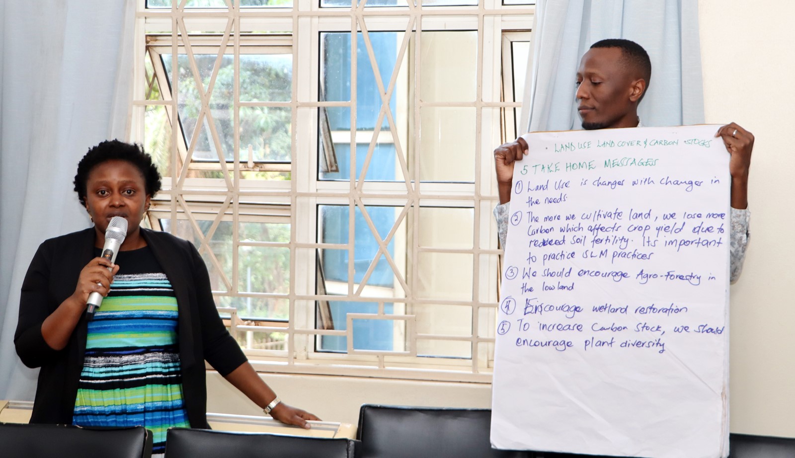 Representatives of Group one presenting their contribution. Department of Geography, Geo-informatics, and Climatic Sciences at Makerere University, in collaboration with the Department of Geography at Kyambogo University, workshop to disseminate research findings from three climate adaptation and mitigation projects funded by the Regional Universities Forum for Capacity Building in Agriculture (RUFORUM), RAINCA, WASCAL, Akademiya2063, and the Carnegie Corporation of New York under the CECAP Program, 19th December 2024, GIS Lab, CoCIS Block A, Makerere University, Kampala Uganda, East Africa.