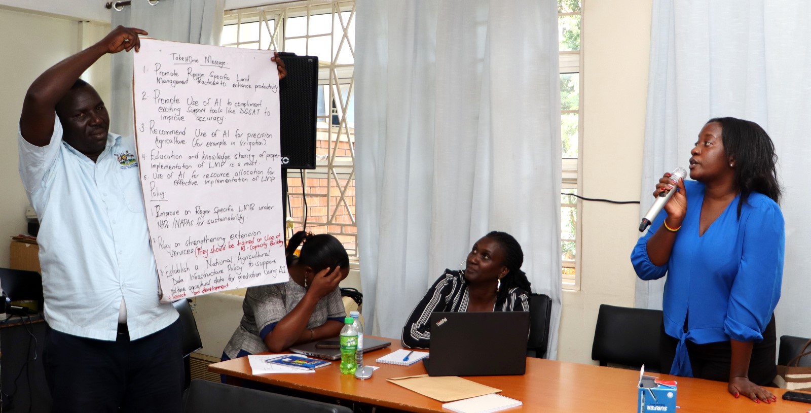 Representatives of Group three presenting the results of their discussion. Department of Geography, Geo-informatics, and Climatic Sciences at Makerere University, in collaboration with the Department of Geography at Kyambogo University, workshop to disseminate research findings from three climate adaptation and mitigation projects funded by the Regional Universities Forum for Capacity Building in Agriculture (RUFORUM), RAINCA, WASCAL, Akademiya2063, and the Carnegie Corporation of New York under the CECAP Program, 19th December 2024, GIS Lab, CoCIS Block A, Makerere University, Kampala Uganda, East Africa.