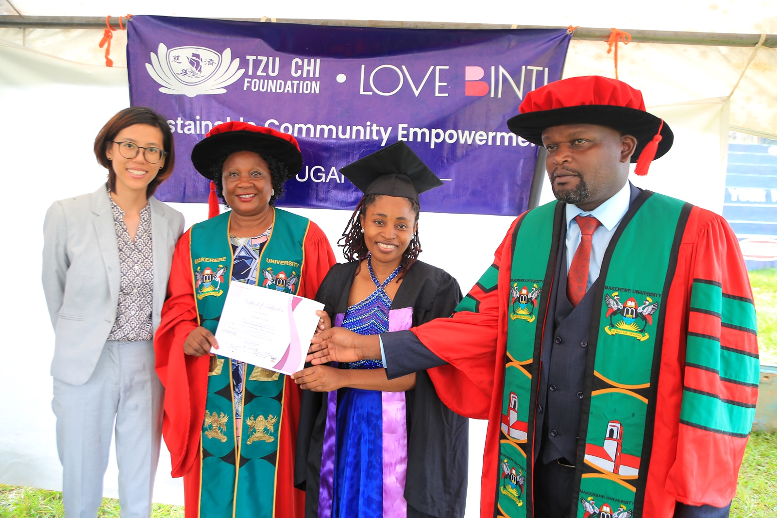 Left to Right: Ms. Elle Yang, Dr. Harriet Nabushawo, a graduating candidate and Dr. Jimmy Tibs Tumwesigye during the award ceremony. 240 students graduated with certificates and diplomas from the College of Education and External Studies (CEES) under the Love Binti Program, which offers training in fashion design and hairdressing, 13th December 2024, Impis Rugby Grounds, Makerere University, Kampala Uganda, East Africa.