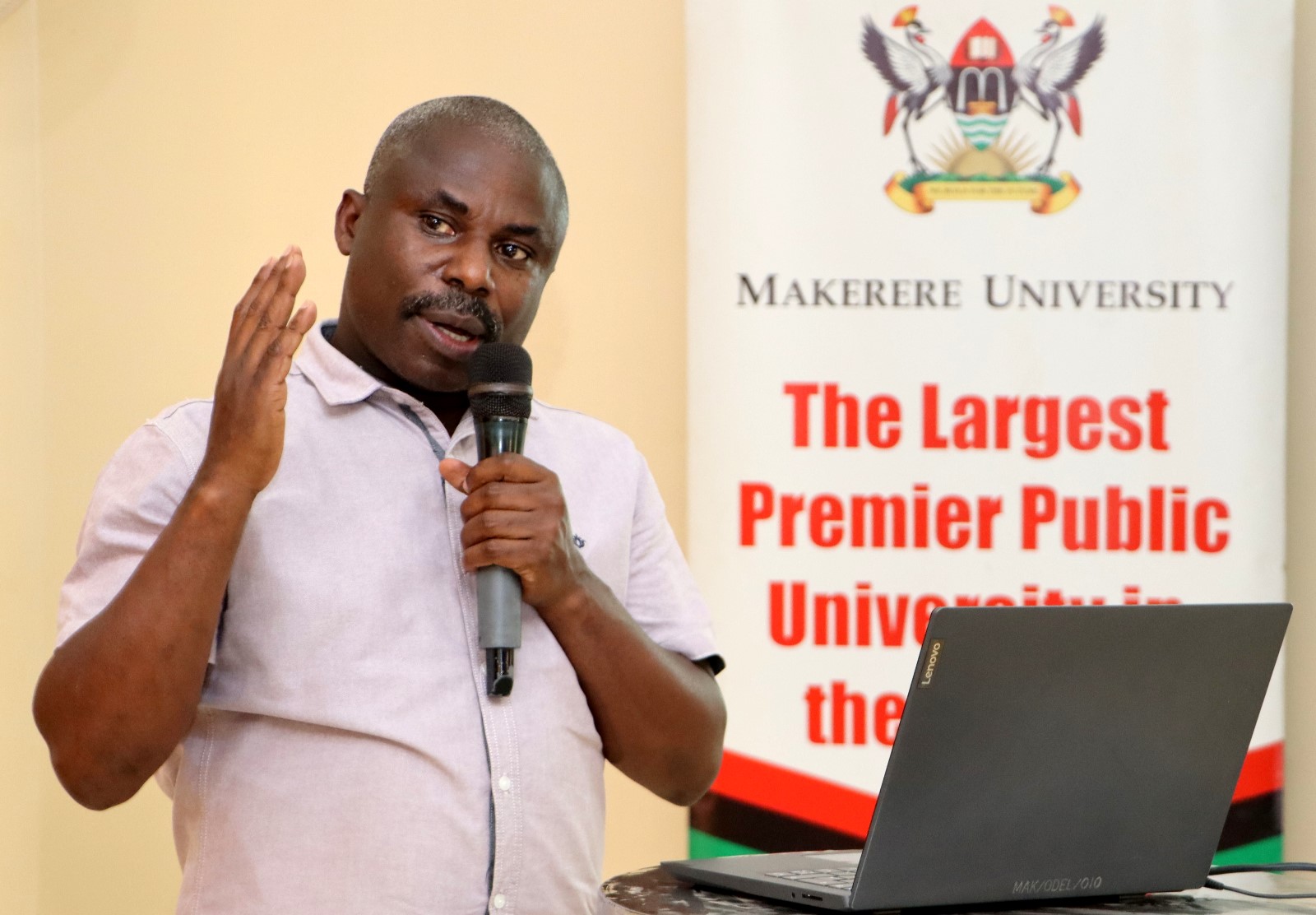 Chief Human Resource Manager Deus Tayari Mujuni training staff on Human Resource Policies and Regulations. The College of Humanities and Social Sciences (CHUSS), Makerere University first-ever non-academic staff retreat, December 7-8, 2024, Grand Global Hotel, Kikoni, Kampala Uganda, East Africa.