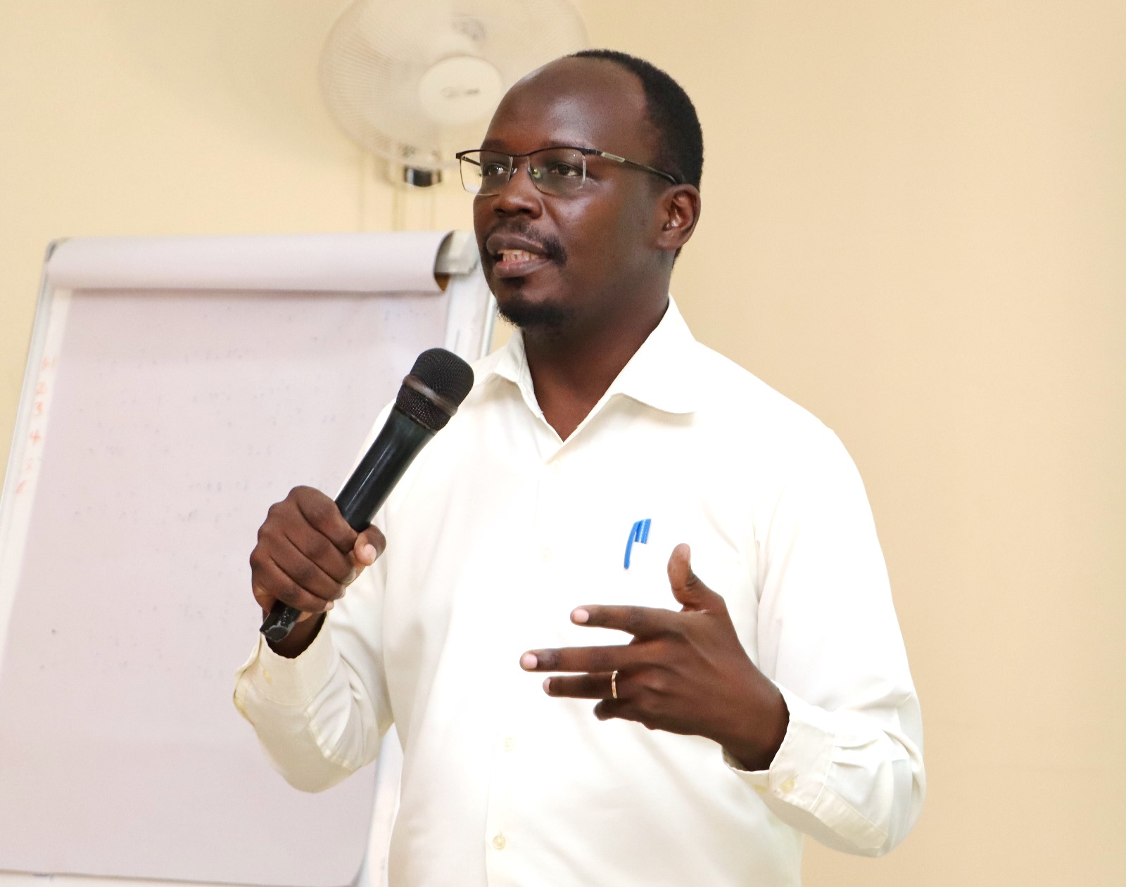 Dr. Dickson Kanakulya presenting on Ethics and Professionalism. The College of Humanities and Social Sciences (CHUSS), Makerere University first-ever non-academic staff retreat, December 7-8, 2024, Grand Global Hotel, Kikoni, Kampala Uganda, East Africa.