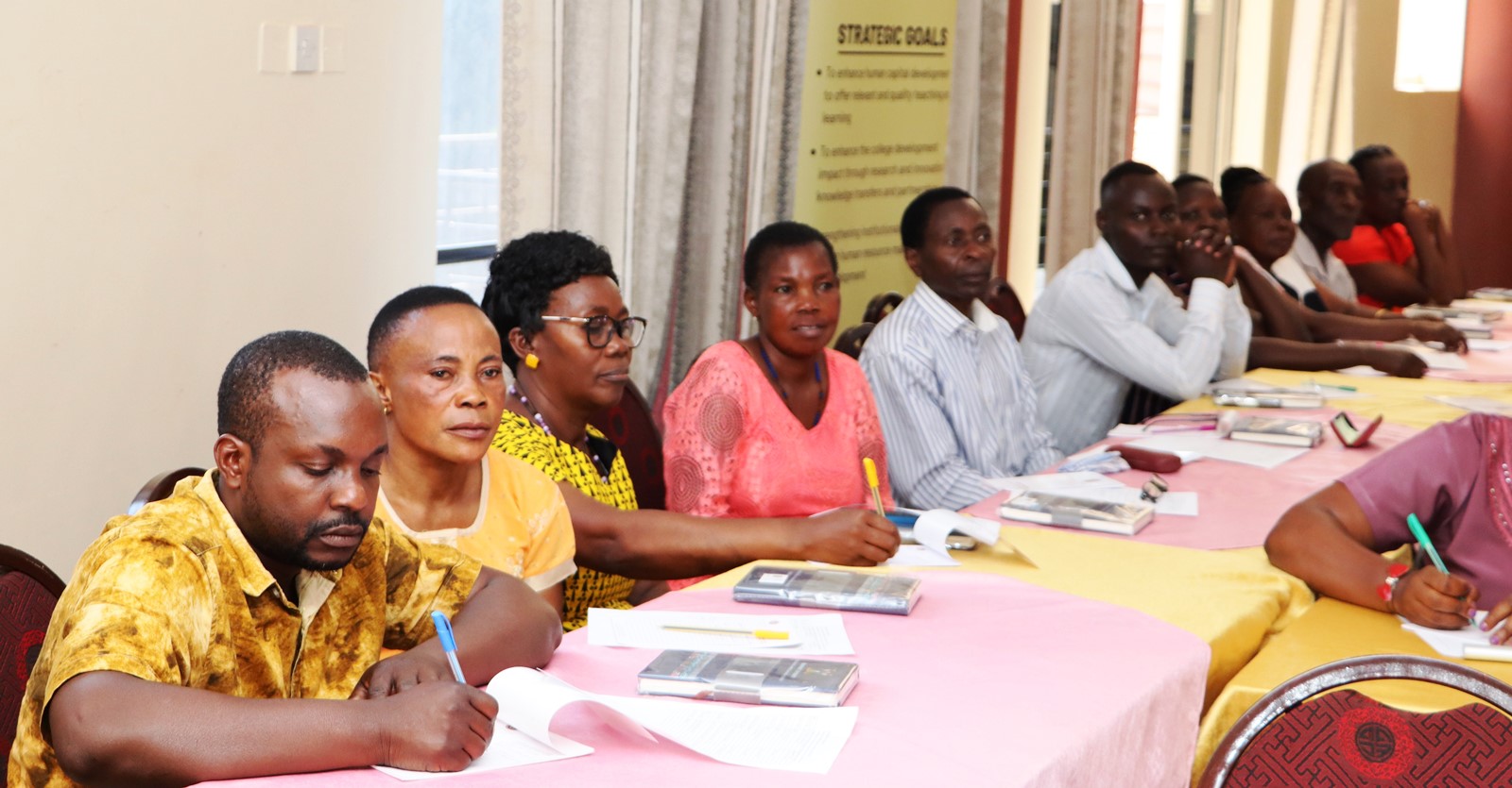 A section of staff follows proceedings. The College of Humanities and Social Sciences (CHUSS), Makerere University first-ever non-academic staff retreat, December 7-8, 2024, Grand Global Hotel, Kikoni, Kampala Uganda, East Africa.