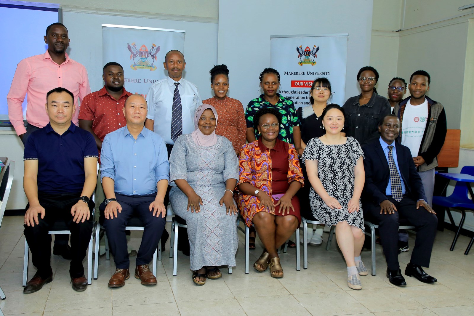 A section of Mak staff and stakeholders in a group photo after the BICAS Program review workshop on 5th December 2024. School of Languages, Literature, and Communication stakeholders’ workshop to review the Bachelor of Chinese and Asian Studies (BICAS) program, 5th December, 2024, Smart Room, College of Humanities and Social Sciences (CHUSS), Makerere University, Kampala Uganda, East Africa.