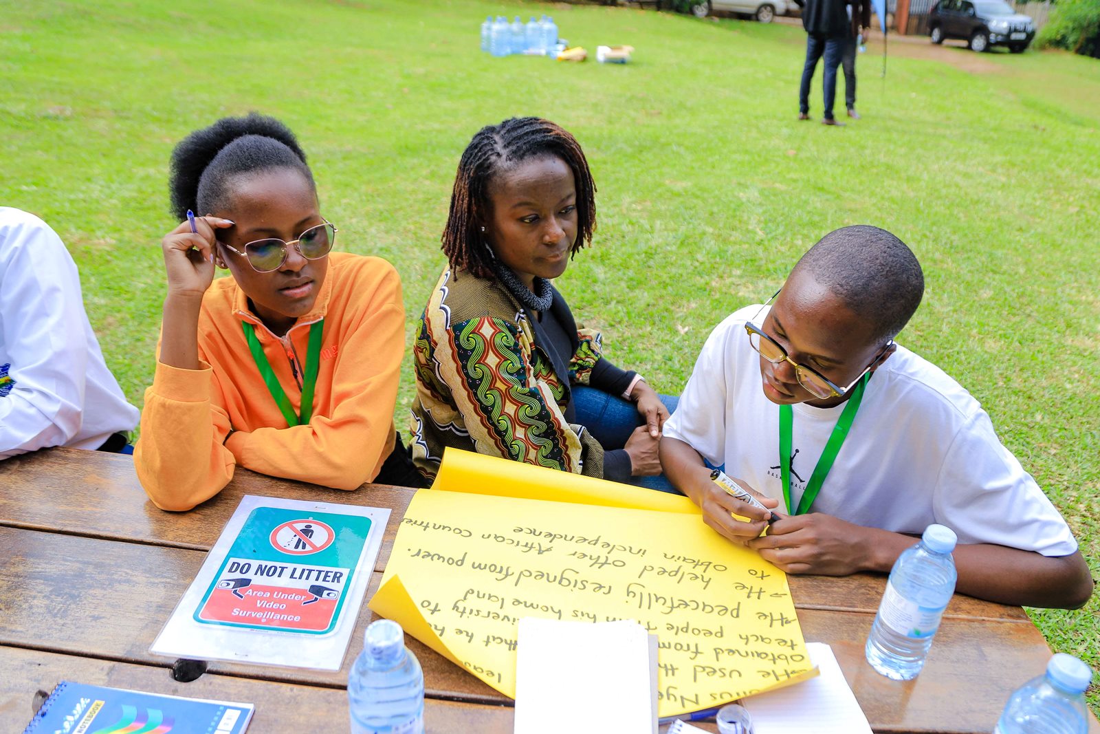 Ms. Gloria Jombwe (Centre) interacts with participants the group sessions. The Julius Nyerere Leadership Center (JNLC) transformative three-day Youth Leadership Training program for secondary school student leaders, December 2024 Makerere University, Kampala Uganda, East Africa.