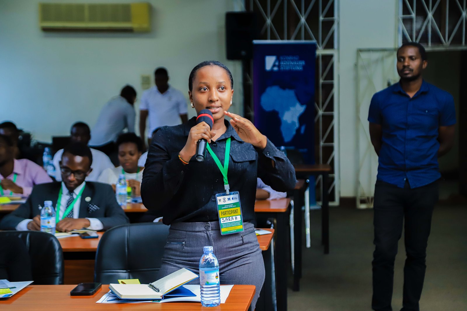 A female participant shares her views. Konrad Adenauer Stiftung-Julius Nyerere Leadership Centre (JNLC) Peace and Security Leadership Training for Finalists and Graduating former Student Leaders in Different Universities in Uganda, Day one, 3rd December 2024, Telepresence Centre, Senate Building, Makerere University, Kampala, East Africa.