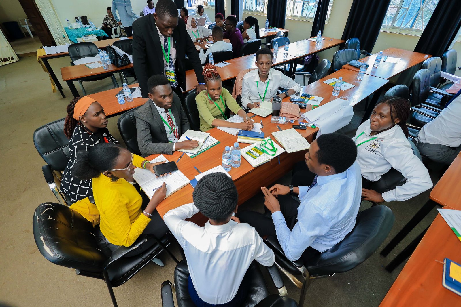 Student Leaders engaged in a group activity. Konrad Adenauer Stiftung-Julius Nyerere Leadership Centre (JNLC) Peace and Security Leadership Training for Finalists and Graduating former Student Leaders in Different Universities in Uganda, Day Two, 4th December 2024, Telepresence Centre, Senate Building, Makerere University, Kampala, East Africa.