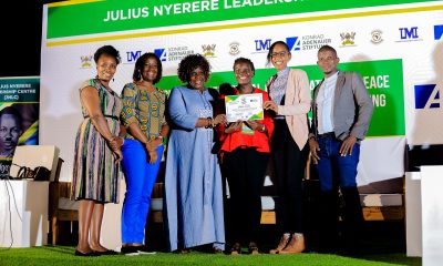 Dr. Nansozi Muwanga (3rd Left) and Ms. Angella Kasekende (2nd Right) together with other officials present a certificate to one of the female Student Leaders - Sheilla Oyella on 5th November 2024. Konrad Adenauer Stiftung-Julius Nyerere Leadership Centre (JNLC) Peace and Security Leadership Training for Finalists and Graduating former Student Leaders in Different Universities in Uganda, Day Three, 5th December 2024, JNLC Gardens, Pool Road, Makerere University, Kampala Uganda, East Africa.