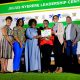 Dr. Nansozi Muwanga (3rd Left) and Ms. Angella Kasekende (2nd Right) together with other officials present a certificate to one of the female Student Leaders - Sheilla Oyella on 5th November 2024. Konrad Adenauer Stiftung-Julius Nyerere Leadership Centre (JNLC) Peace and Security Leadership Training for Finalists and Graduating former Student Leaders in Different Universities in Uganda, Day Three, 5th December 2024, JNLC Gardens, Pool Road, Makerere University, Kampala Uganda, East Africa.