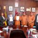 The Vice Chancellor-Prof. Barnabas Nawangwe (3rd Left) and Commissioner General Uganda Prisons Service (UPS)-Dr. Johnson Byamugisha (Centre) flanked by Left to Right: Dr. Patricia Atim, Dr. Zahara Nampewo and UPS Officials show off the signed MoU on 10th December 2024. Makerere University and Uganda Prison Services (UPS) sign Memorandum of Understanding that paves way for Makerere University School of Law to undertake short trainings in administrative law for UPS staff, 10th December 2024, Kampala Uganda, East Africa.