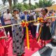 Hon. Janet Kataaha Museveni, First Lady and Minister of Education and Sports cut the ribbon at the opening of the School of Law Building, left is the State Minister for Primary Education Hon. Dr. Joyce Moriku Kaducu and Mak Council Chairperson Mrs. Lorna Magara on the right.