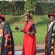 Minister Moriku Kadducu and the new University Chancellor, Dr. Crispus Kiyonga (at the back), during the academic procession at Makerere University. Kampala Uganda, East Africa.