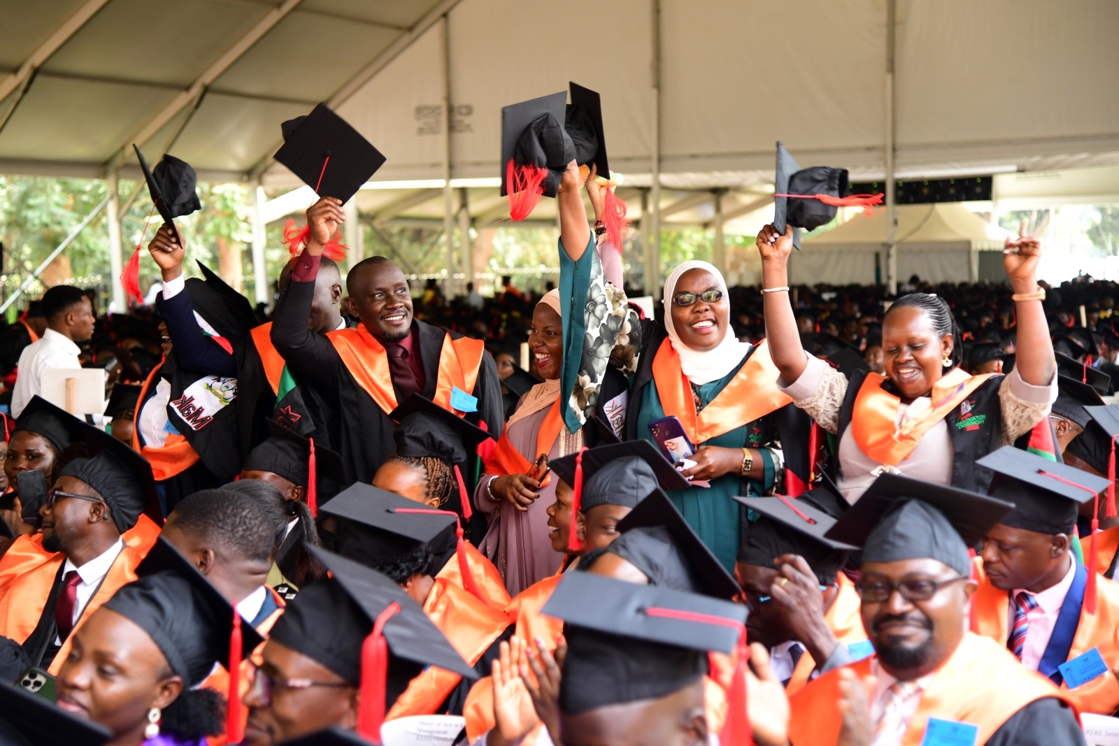 Masters Graduands from the College of Education and External Studies (CEES) express their joy. 75th Graduation Ceremony, Day 1, CoCIS, CEES, CoVAB and School of Law. 13th January 2025, Freedom Square, Makerere University, Kampala Uganda, East Africa.