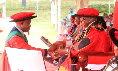 Hon. Dr. Crispus Kiyonga Conferring a PhD upon a candidate Geofrey Kapalaga. 75th Graduation Ceremony, Day 1, CoCIS, CEES, CoVAB and School of Law. 13th January 2025, Freedom Square, Makerere University, Kampala Uganda, East Africa.