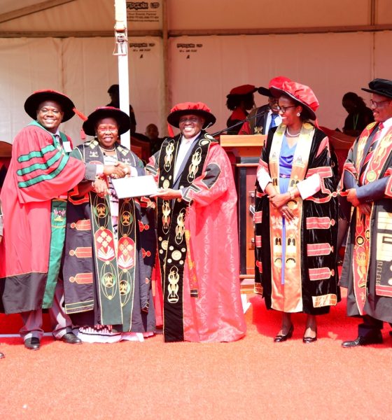 Hon. Dr. Crispus Kiyonga (C) and Hon. Dr. Joyce Moriku Kaducu (3rd L) present the Research Excellence Award to Prof. Mugisha Lawrence from the College of Veterinary Medicine, Animal Resources and Biosecurity (CoVAB) (2nd L). 75th Graduation Ceremony, Day 1, CoCIS, CEES, CoVAB and School of Law. 13th January 2025, Freedom Square, Makerere University, Kampala Uganda, East Africa.