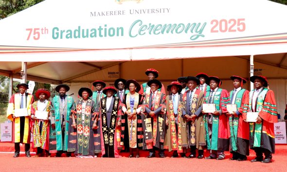 The Guest of Honour-Hon. Dr. Joyce Moriku Kaducu (4th L) and Chancellor-Hon. Dr. Crispus Kiyonga (5th L) with Chairperson Council-Mrs. Lorna Magara (6th L), VC-Prof. Barnabas Nawangwe (6th R), Ag. DVCFA-Prof. Henry Alinaitwe (4th R), AR-Prof. Buyinza Mukadasi (5th R), Chief DRIP-Dr. Robert Wamala (3rd L) and Research and Teaching Excellence Award Recipients. 75th Graduation Ceremony, Day 1, CoCIS, CEES, CoVAB and School of Law. 13th January 2025, Freedom Square, Makerere University, Kampala Uganda, East Africa.